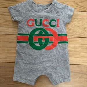 Gucci onesie size 0-3